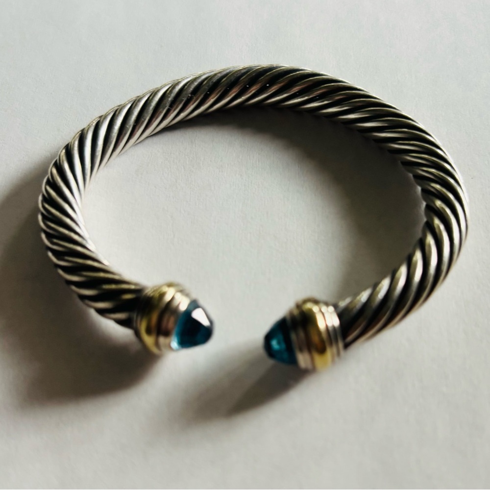 Elegant David Yurman cable bracelet with topaz stone